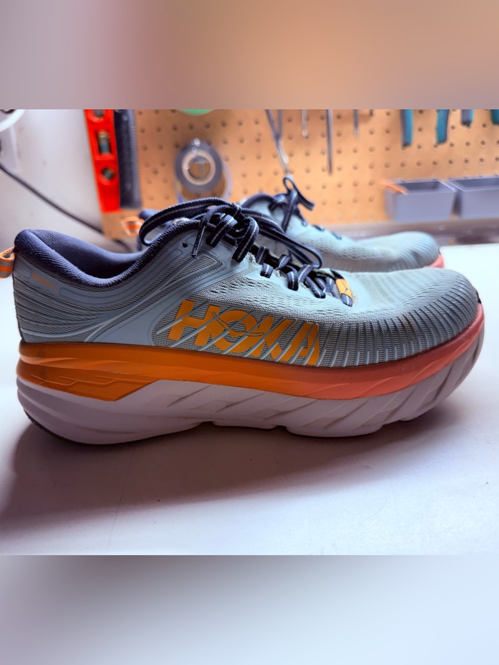 HOKA women’s bondi Cushioning Running Shoes - Light Blue/Orange